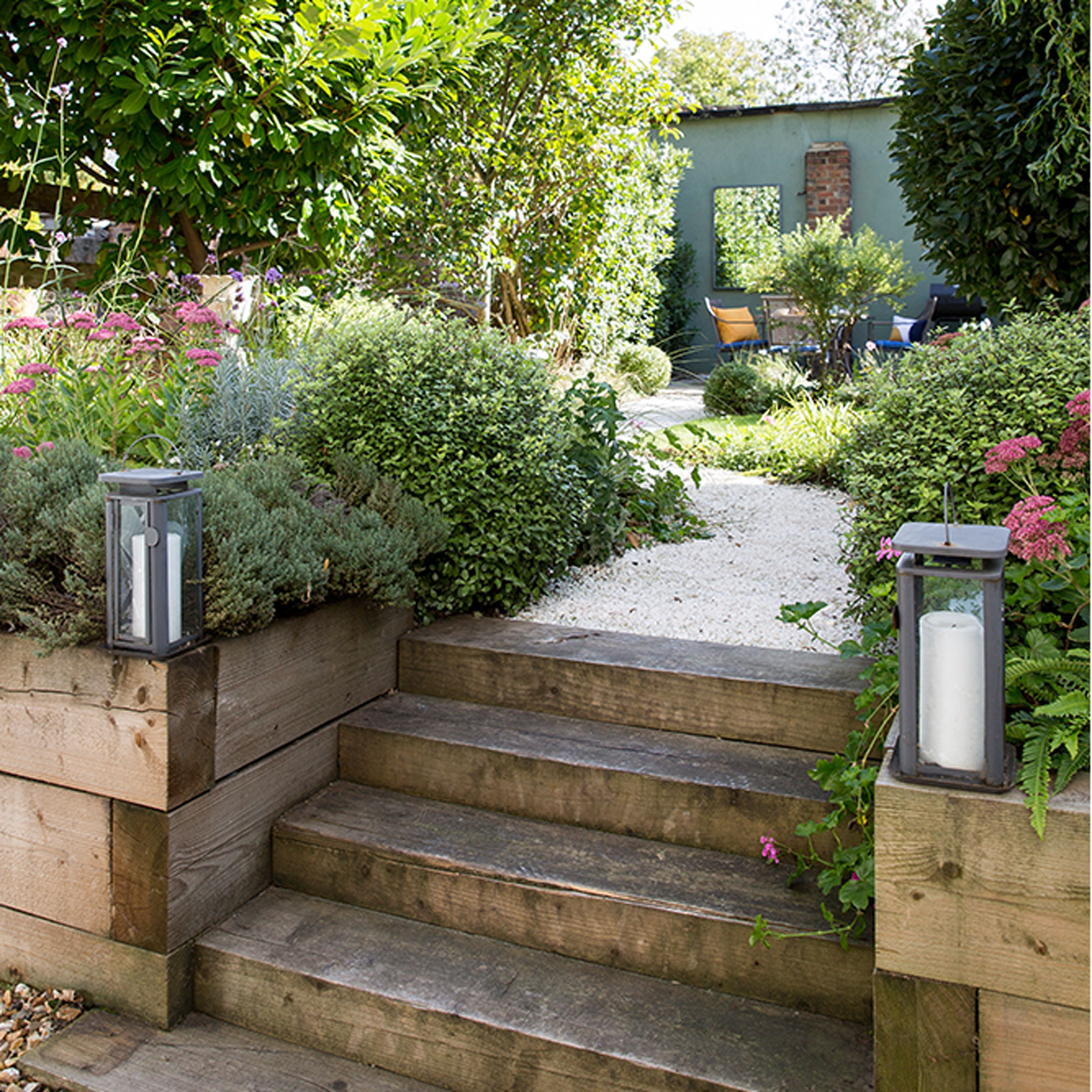 garden steps with blue painted garden wall