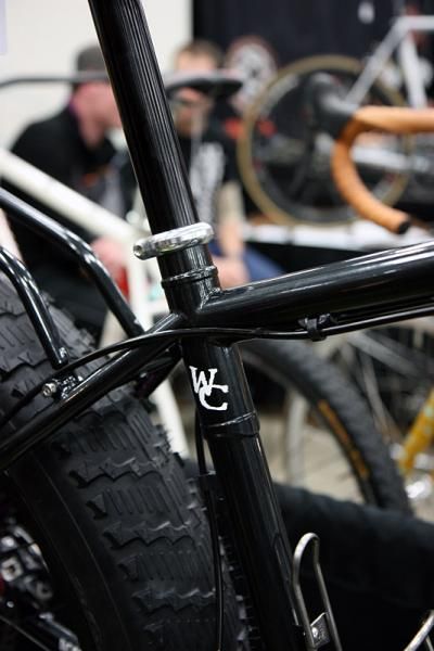 The sleeved seat cluster on this Watson Cycles snow bike looks impressively burly.