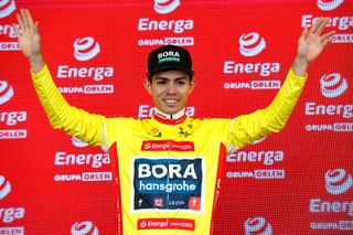 PRZEMYSL POLAND AUGUST 01 Sergio Andres Higuita Garcia of Colombia and Team Bora Hansgrohe celebrates at podium as Yellow Leader Jersey winner during the 79th Tour de Pologne 2022 Stage 3 a 2379km stage from Kranik to Przemyl TdP22 WorldTour on August 01 2022 in Przemysl Poland Photo by Bas CzerwinskiGetty Images