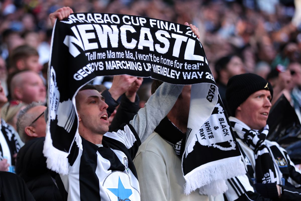 We Are Newcastle United episode 2: a fan holds a scarf at the Wembley cup final