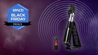 Darth Vader Force FX Elite lightsaber on a purple background with a Space Black Friday deals badge.