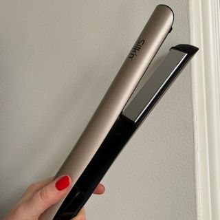 Laura holding Silk'n Silky Straight Infrared Hair Straightener - best hair straighteners