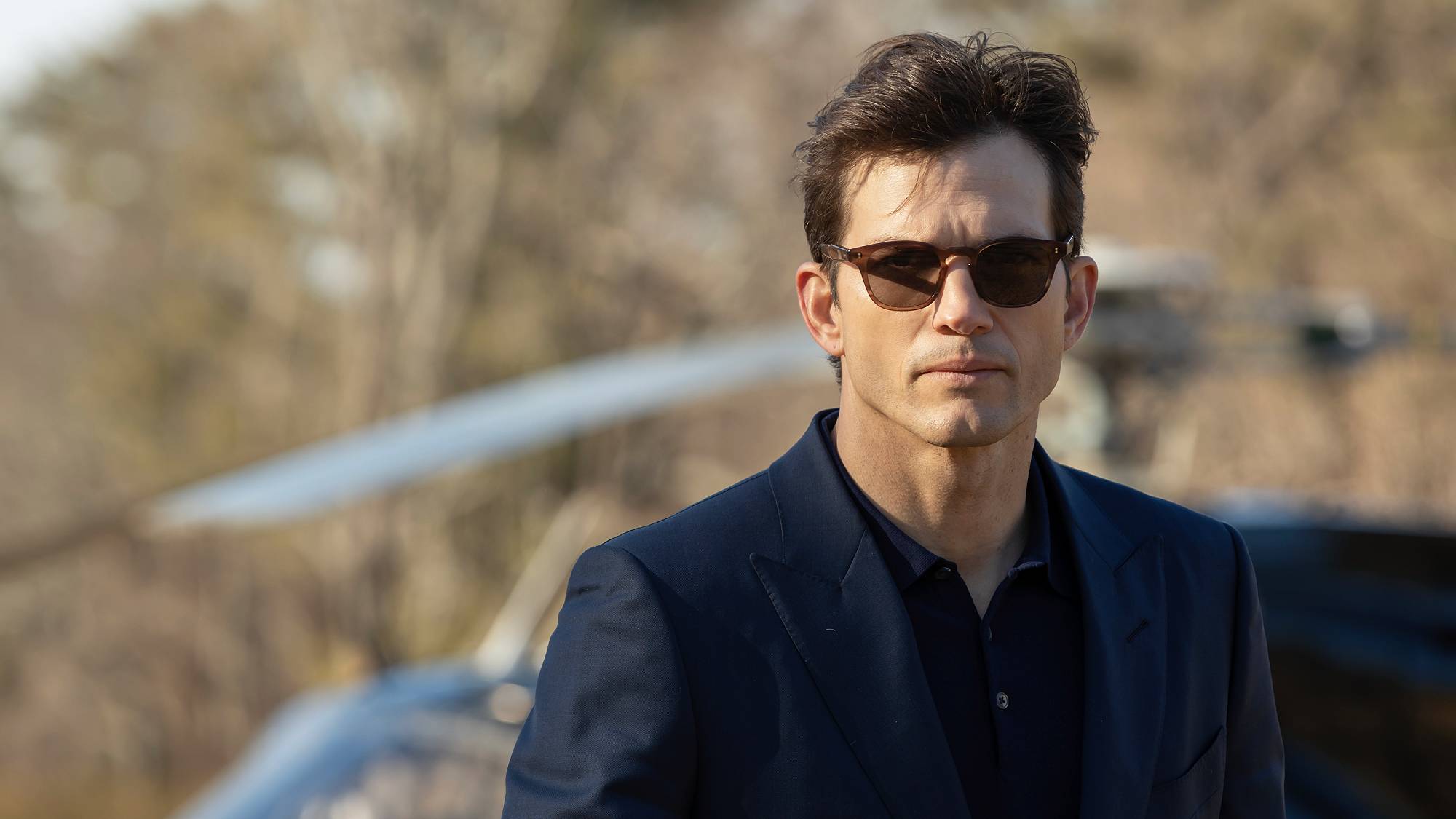 Ashton Kutcher as The Corporation in "The Beauty" (2026)