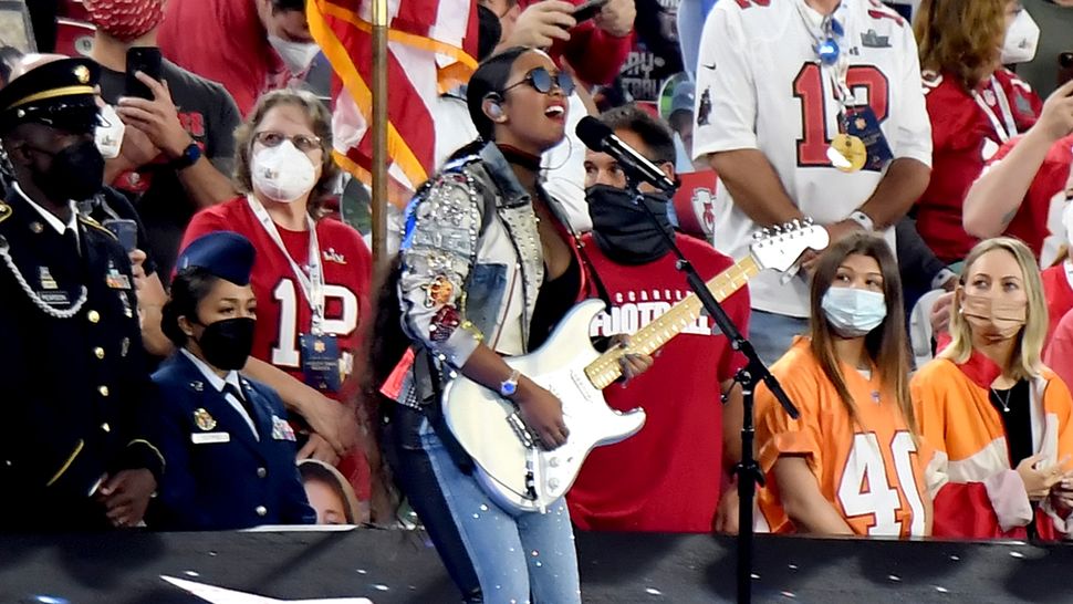 super bowl performer with guitar