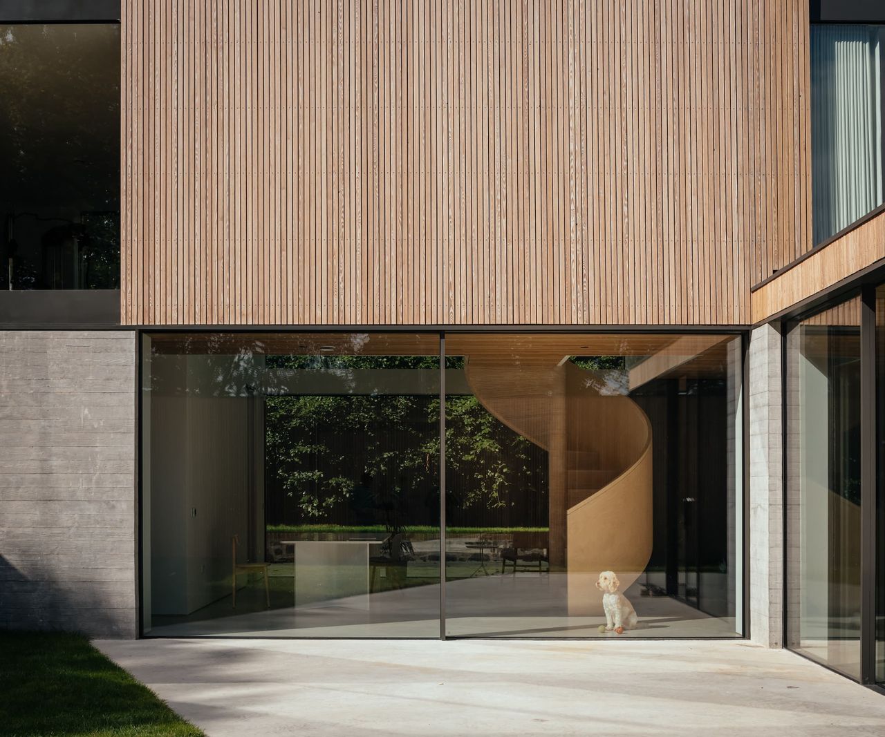 Timber cladding panels above a large picture window