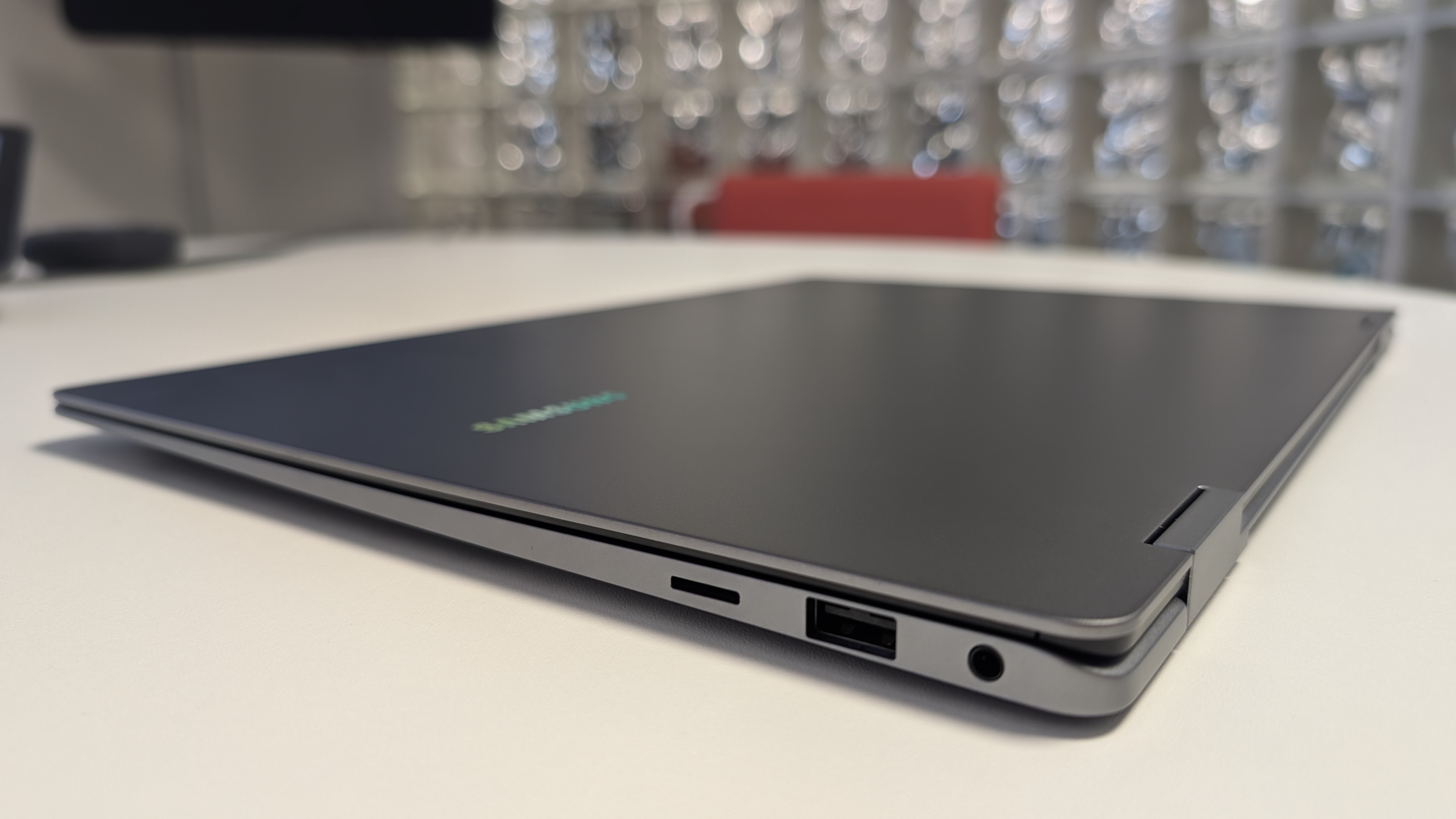 The Samsung Galaxy Book5 Pro 360 photographed on a white desk.