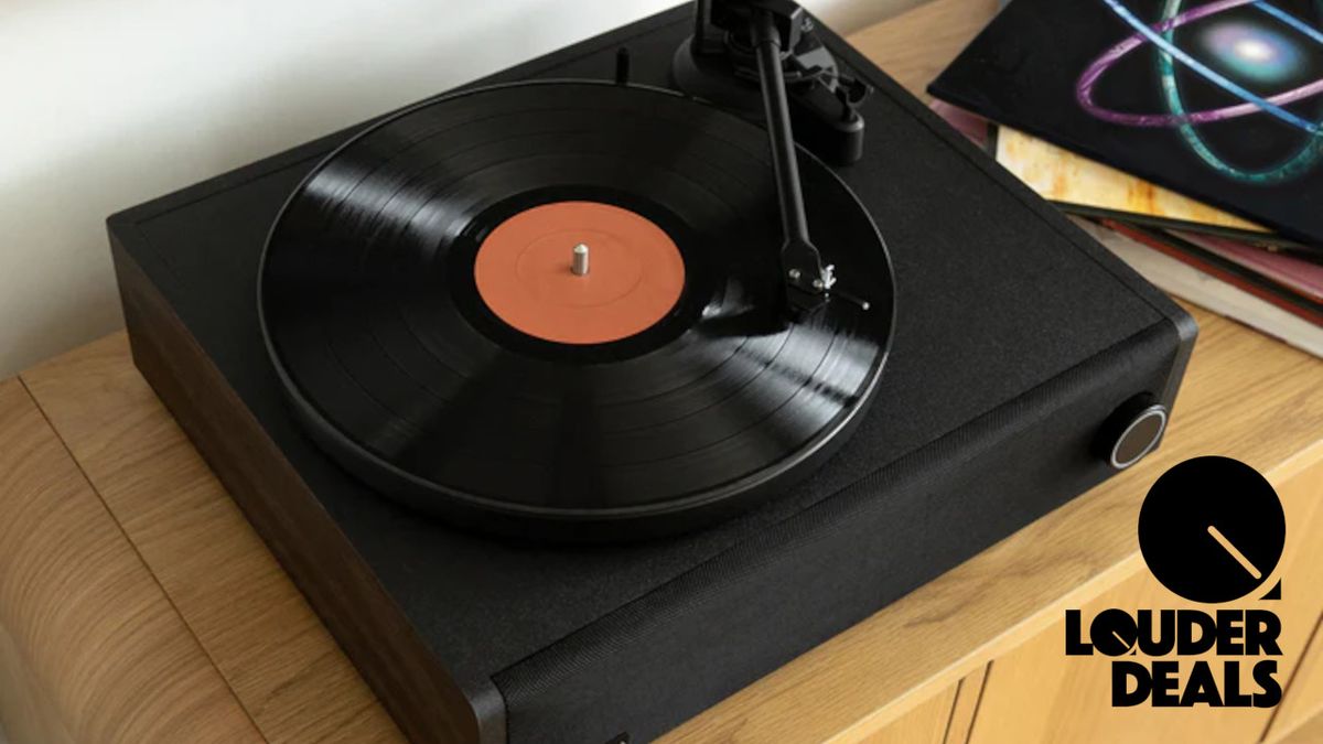 Above shot of a Victrola record player with a Louder Deal badge in the corner