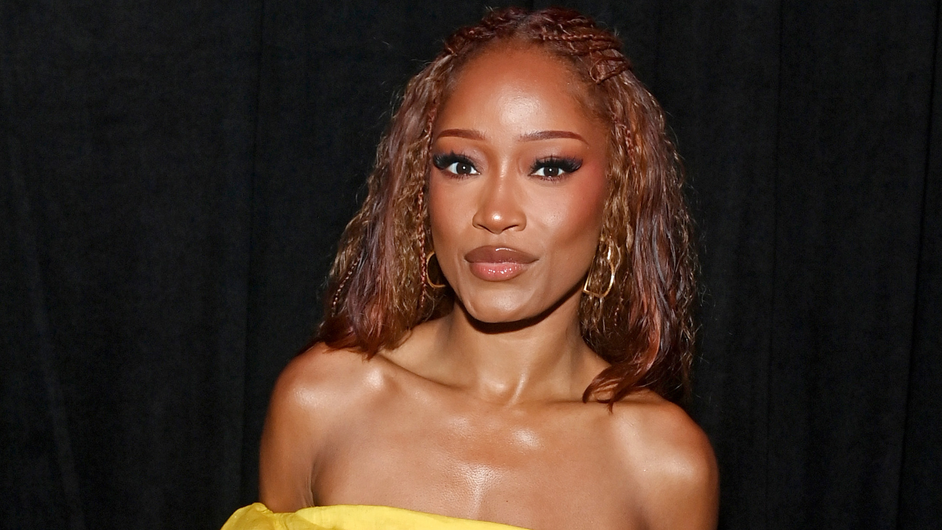 Keke Palmer smiling at the camera