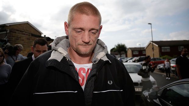 CROYDON, ENGLAND - AUGUST 08:Stuart Hazell, step-grandfather of missing schoolgirl Tia Sharp is led away from his partners house by police on August 8, 2012 in New Addington, England. Tia has