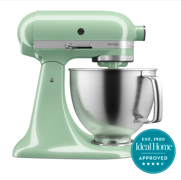 A green KitchenAid artisan stand mixer with an Ideal Home 4.5 stars Ideal Home approved badge in the corner