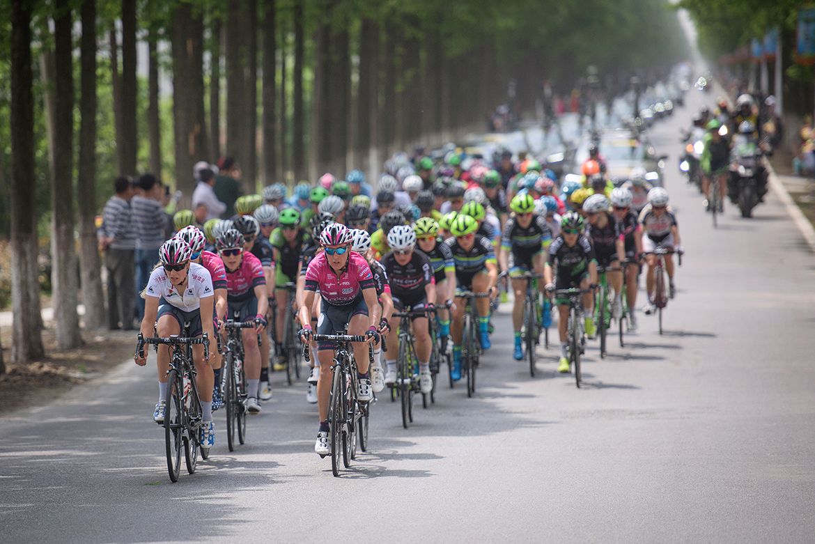 The peloton winding up to speed on the third stage of the Tour of Chongming Island