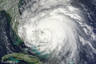 Hurricane Irene is a large and dangerous storm. In this image, taken by the Moderate Resolution Imaging Spectroradiometer (MODIS) on the Terra satellite on August 25, 2011, bands of thunderstorms spiral tightly around a dense center, forming the circular shape of a well-developed hurricane.