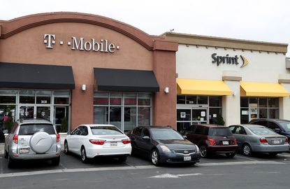 A T-Mobile store and a Sprint store in Cerritos, California.