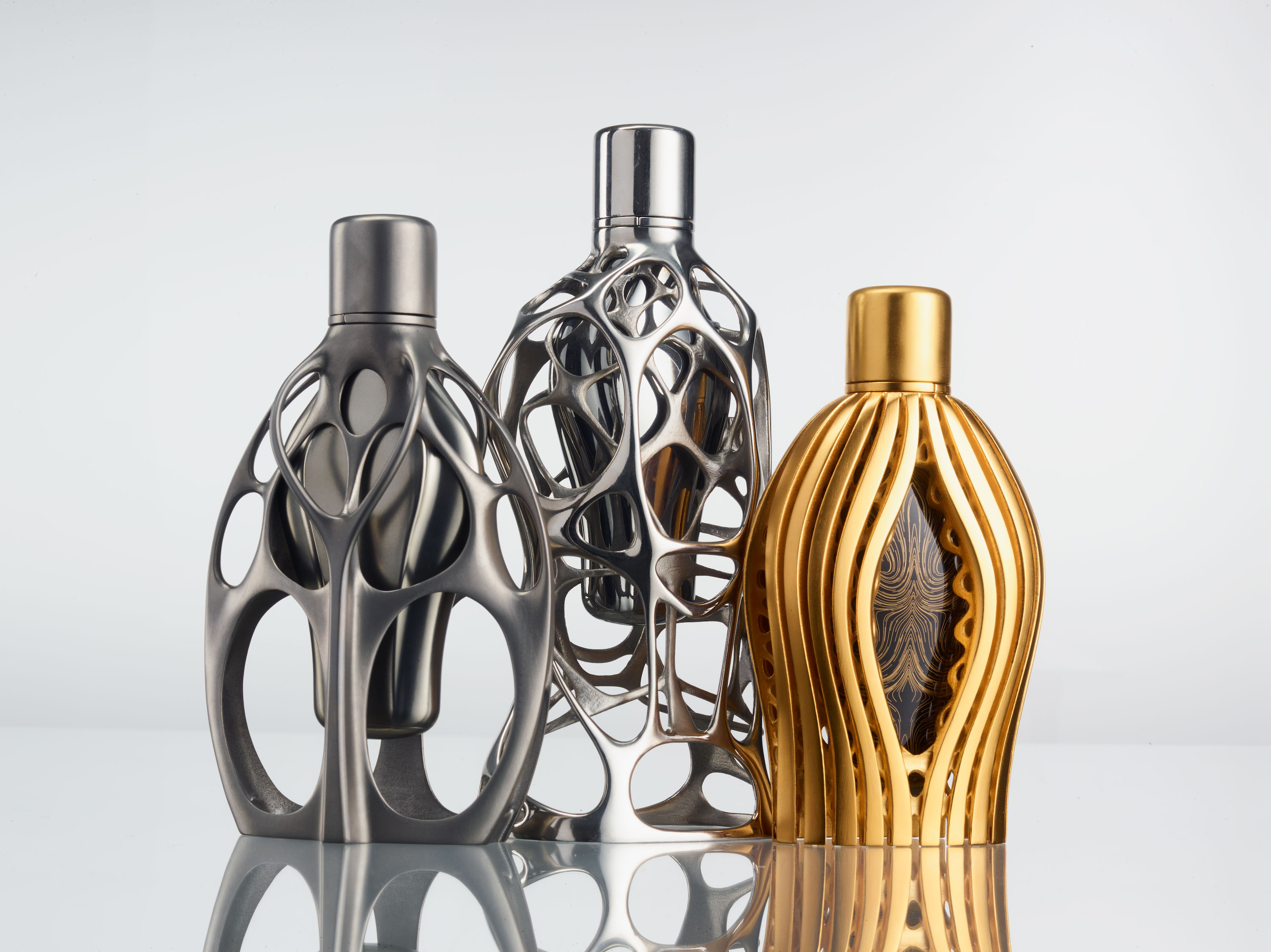 Premium Photo  Several perfume bottles with intricate designs and  beautiful packaging each bottle has a unique shape and color scheme with  some featuring floral motifs or metallic accents generative ai