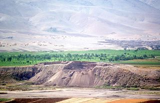 the mountains of western iran where an archaeological site called Godin Tepe resides