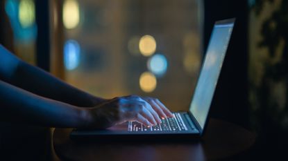 A stock photo of a pair of hands typing on the computer. 