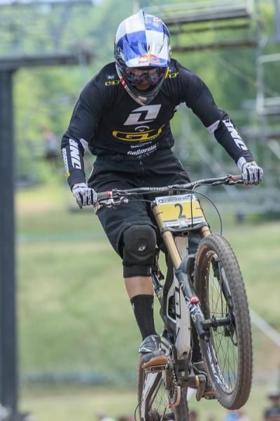Rachel Atherton (GT Factory Team) clears the final jump and sprints in for the win.