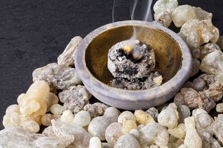 Frankincense burning on a hot coal. 