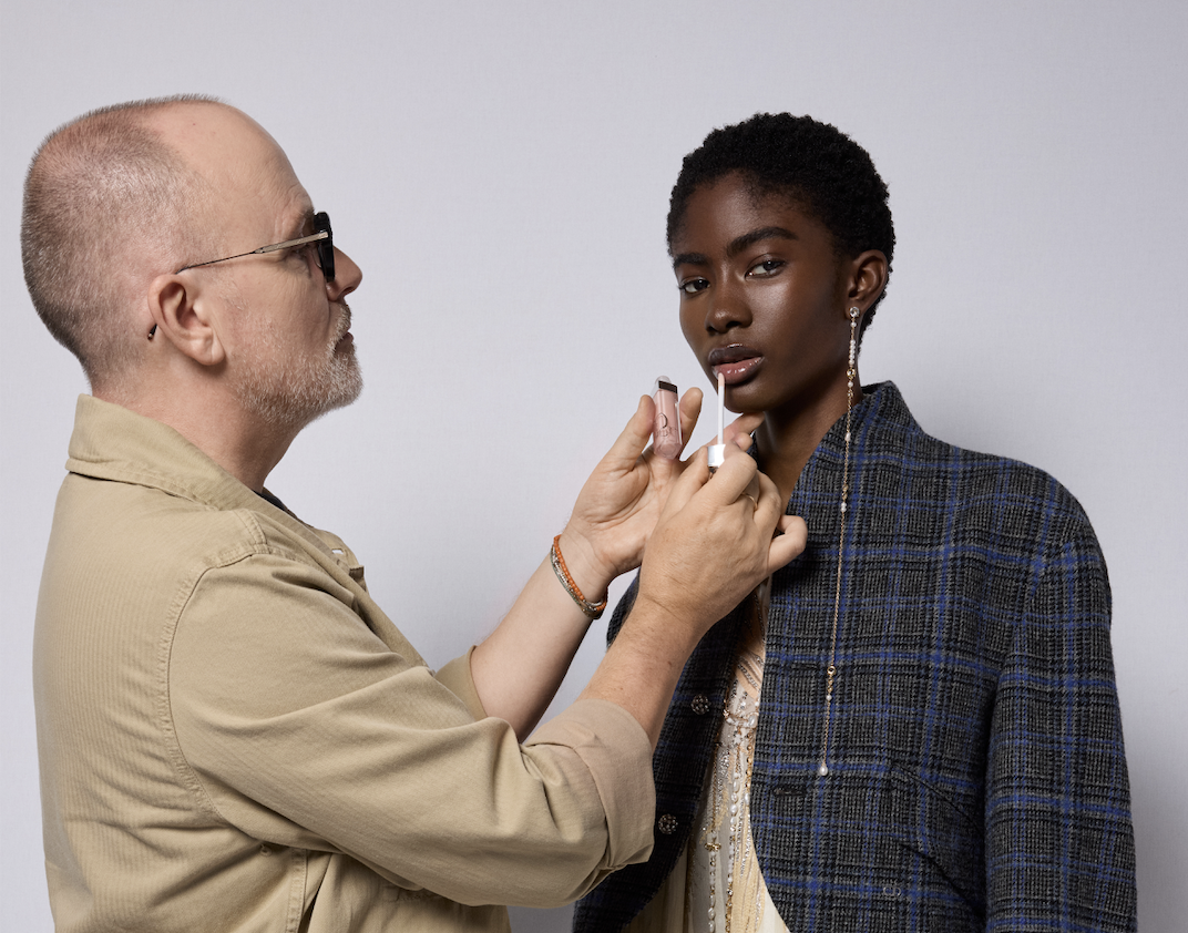 Dior Spring/Summer 2027 Peter Philips applying makeup backstage