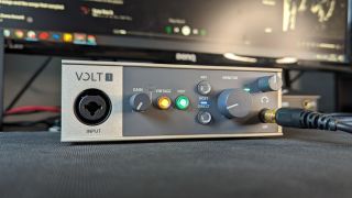 A Universal Audio Volt 1 audio interface on a desk