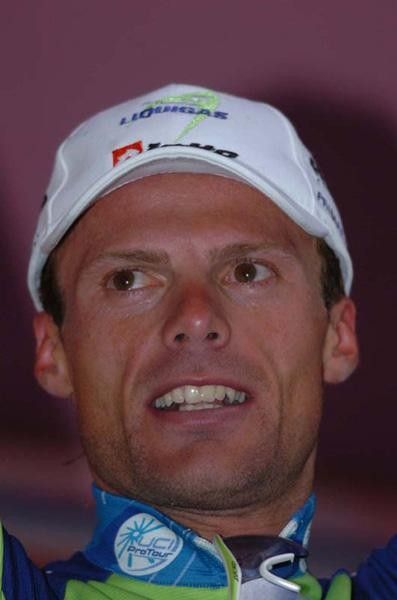 Di Luca on the stage after winning stage 4.