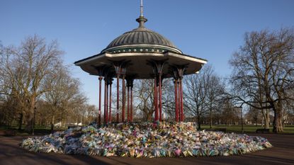 Flowers surround the Clapham Common bandstand memorial to murdered Sarah Everard on March 27, 2021 in London