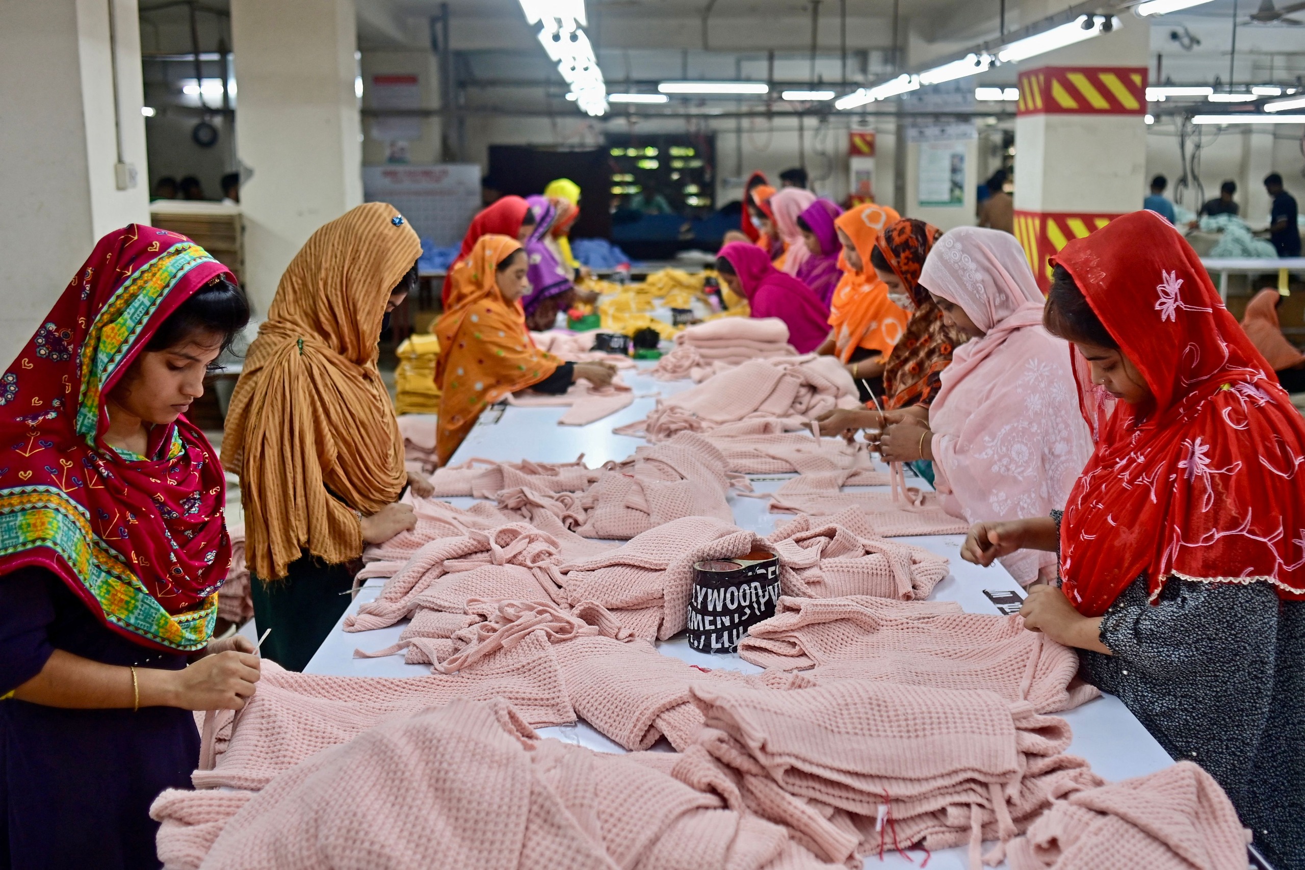women work at a garment factory in Savar, on the outskirts of Dhaka