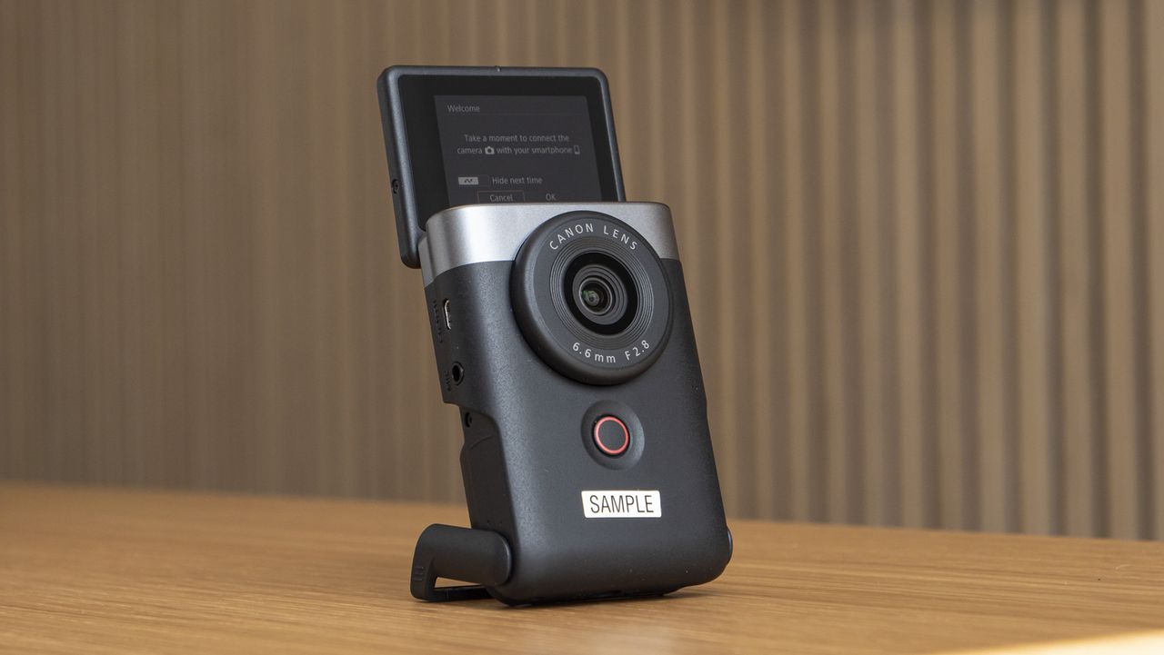 Canon Powershot V10 on a table with flip-up screen