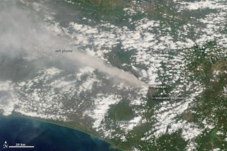 A thick plume of ash rose above Merapi on Nov. 10.