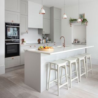 white kitchen with worktop and cabinets