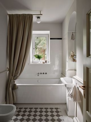 Beige bathroom with shower curtain