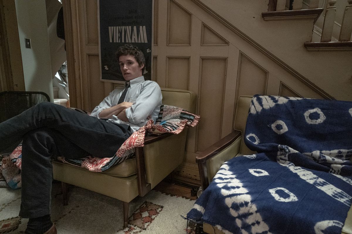 Eddie Redmayne as Tom Hayden in The Trial of the Chicago 7.