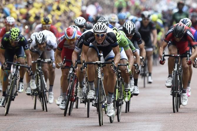 Marcel Kittel (Giant-Shimano) sprints to the stage 3 win ahead of Peter Sagan (Cannondale) and Mark Renshaw (Omega Pharma-QuickStep)