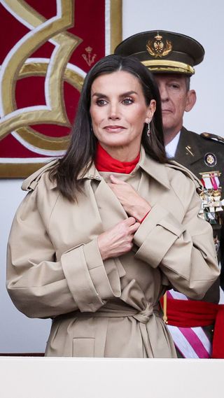 Queen Letizia wearing beige trench coat