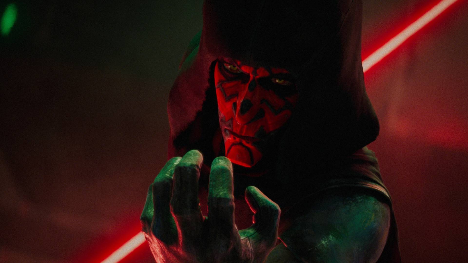 Maul (Sam Witwer) in a hood, using the force, with his dual lightsaber drawn in Maul &ndash;&nbsp;Shadow Lord
