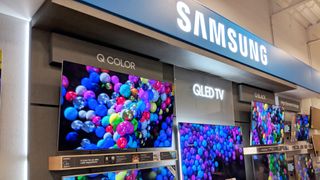 Samsung QLED TVs in Best Buy store