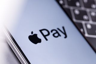 Image of Apple Pay logo on an iPhone