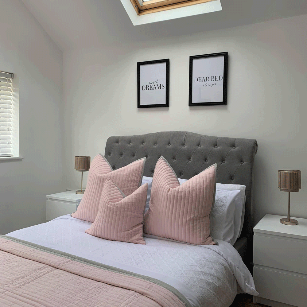 bedroom with photoframe on wall