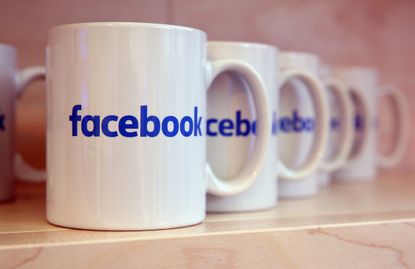 The Facebook logo on mugs