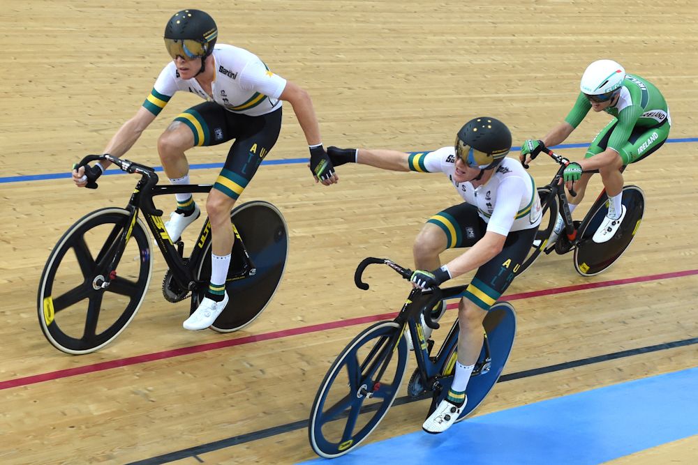 Australia's Cameron Meyer (L) and Callum Scotson compete during the men's madison final at the Hong Kong Velodrome