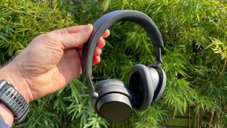 Sennheiser Accentum Plus Wireless noise cancelling over-ears held in hand