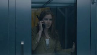 Amy Adams on the phone in a screenshot from Arrival.