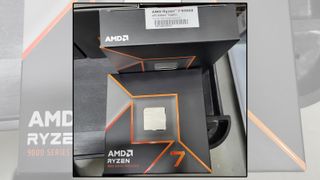 AMD Ryzen 9 9700X processors in retail boxes