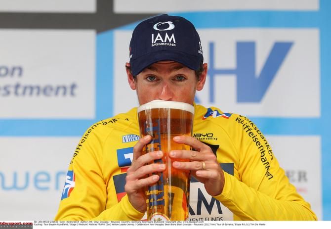 Mathias Frank (IAM Cycling) getting through his beer