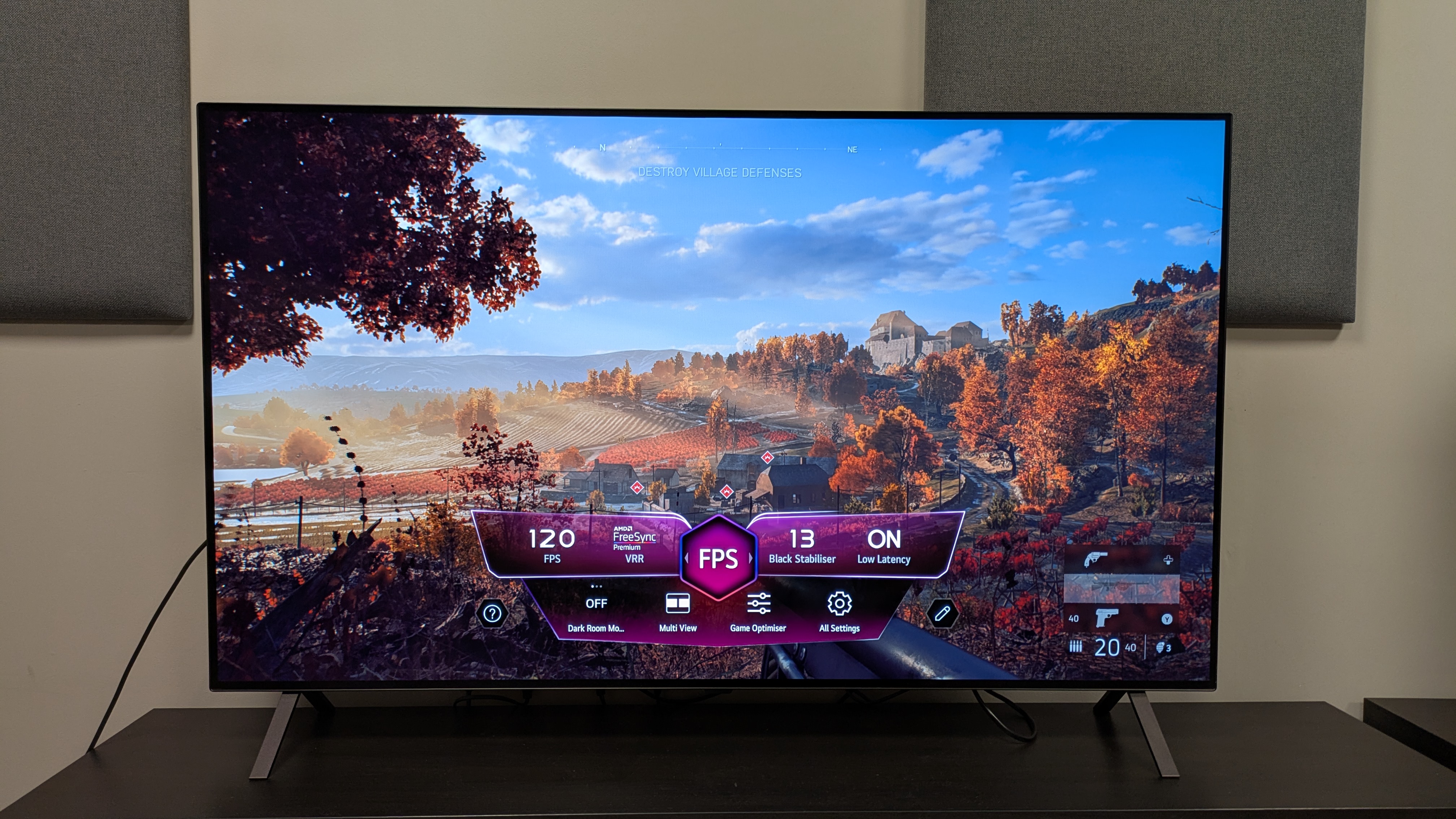 LG B5 OLED TV with Battlefield V and game optimizer menu on screen