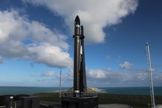 A Rocket Lab Electron booster carrying satellites for the U.S. National Reconnaissance Office, NASA and more stands atop Launch Complex 1 at Mahia Peninsula, New Zealand ahead of the "Don't Stop Me Now" mission launching on June 11, 2020.
