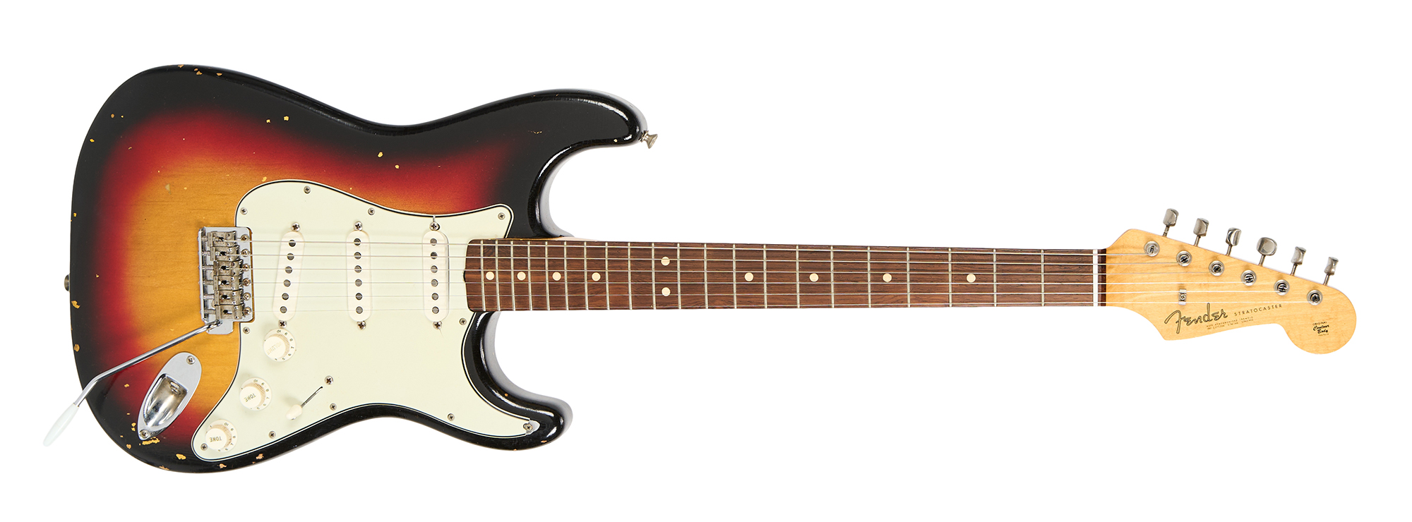 A photo of Rick Nielsen's 1963 Fender Stratocaster with a mint-green pickguard, chrome tremolo bridge and output jack plate, and white pickup covers and knobs. Its estimate is $40,000 to $60,000.