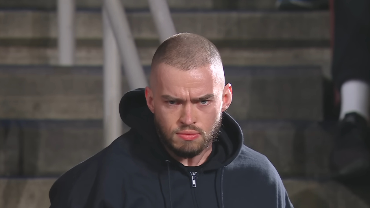 Austin Theory after being revealed to be the first masked man in WWE