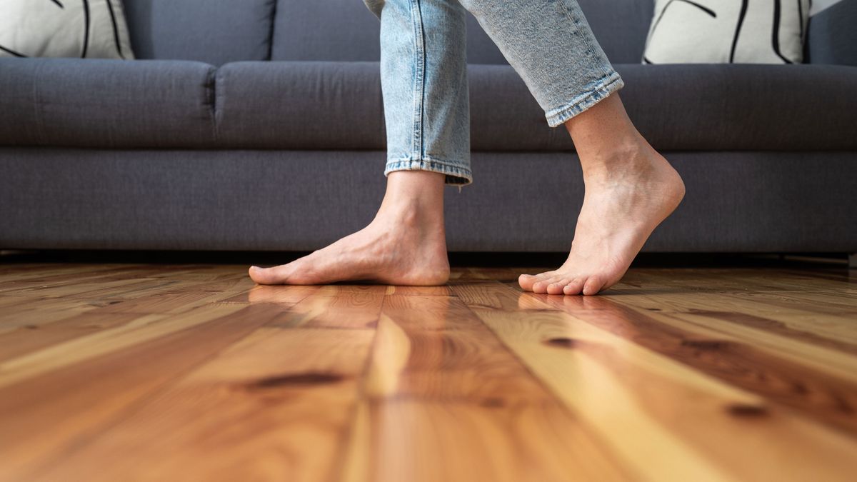 bare feet on wooden floor