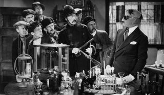 The Invisible Man onlookers reeling away from Dr. Griffin and his chemistry set